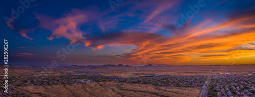Εκτύπωση καμβά Panoramic aerial view of a desert community in Arizona during the golden hour at sunset