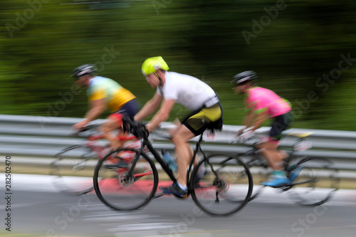 Amateur bicycle racer on racing circuit - Stockphoto