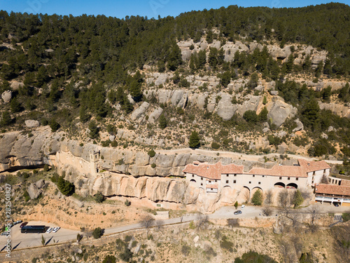 Sanctuary of the Virgin of Balma built in rock in the mountains in Spain photo