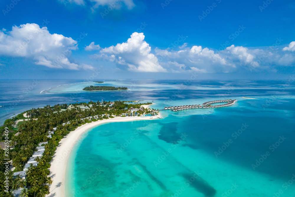 Aerial view of beautiful island at Maldives in the Indian Ocean. Top view from drone.