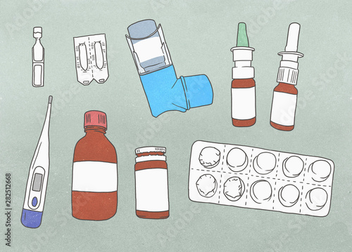 Medical supplies arranged against a gray background photo