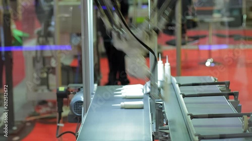 Wallpaper Mural Automatic robot arm working in industrial environment Torontodigital.ca