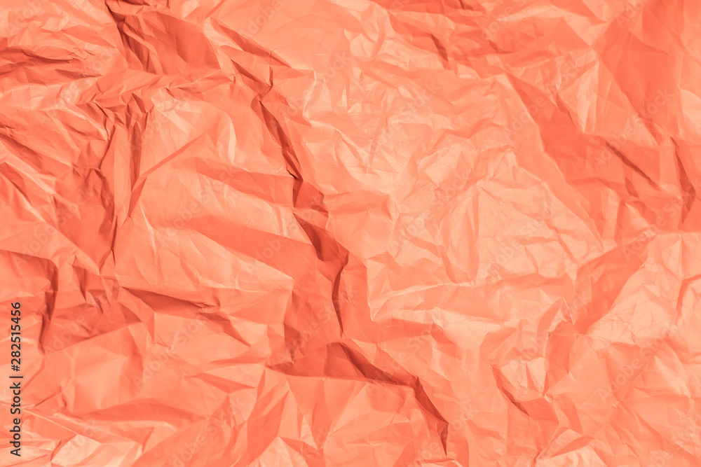 Obraz premium red peach texture background crumpled paper. copy space place for text background splash banner texture color stylish trendy fashion