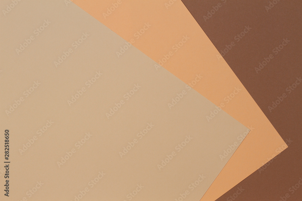 Color papers geometry composition banner background with beige, light brown and dark brown tones. Color papers geometry composition banner background with beige, light brown and dark brown tones.