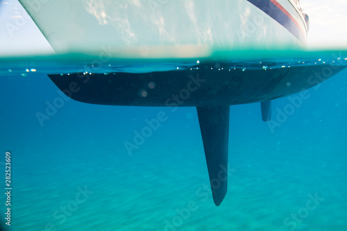 Sailing boat under water, partial view