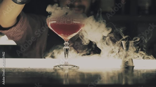 Halloween cocktail with dry ice at the bar