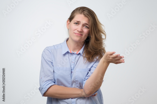 Fotografija Tired annoyed woman listening boring story of her friend.