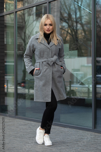 Young woman in a coat for autumn winter fashion © lashkhidzetim