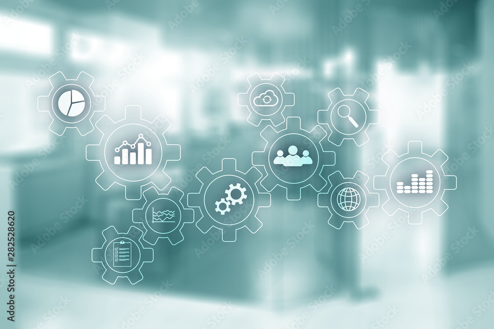Blurred Office Space. Business Technology process abstract diagram with gears and icons. Workflow and automation technology concept Blurred Office Space. Business Technology process abstract diagram with gears and icons. Workflow and automation technology concept