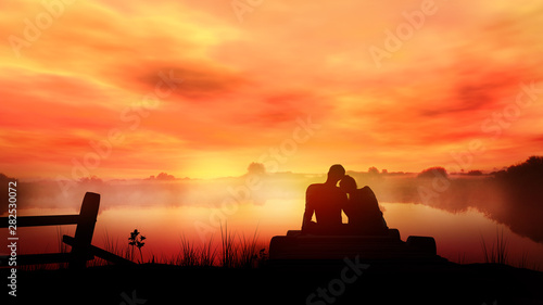Loving couple on red sunset...