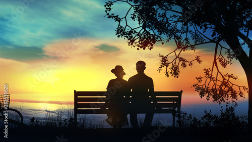 Couple on a bench under the tree watching the ocean © conceptcafe