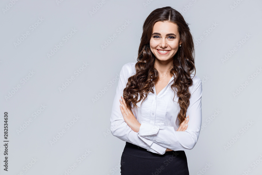 Portrait of young modern business woman in classic suit