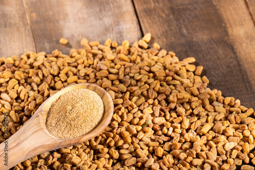 Obraz na płótnie organic fenugreek seeds powder - Trigonella foenum - graecum