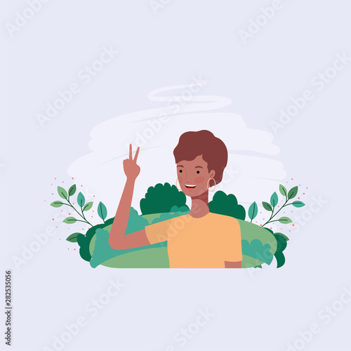 young afro girl in the camp with leafs