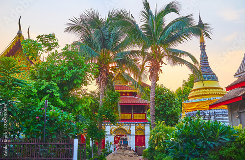 The lush garden of Wat Muen Larn, Chiang Mai, Thailand photo