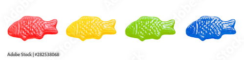 Isolated multicoloured fish-shaped jellies. Jellyfish. Typical norwegian sweets called Jordbærfisker.