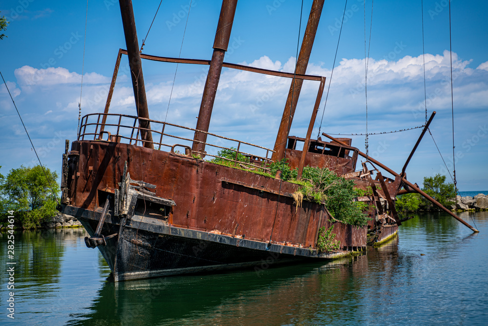 abandoned ship decaying in lake 