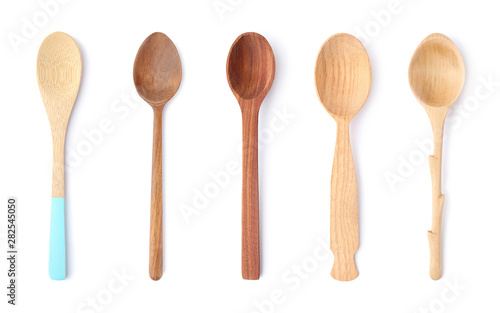 Set of different wooden spoons on white background, top view © New Africa