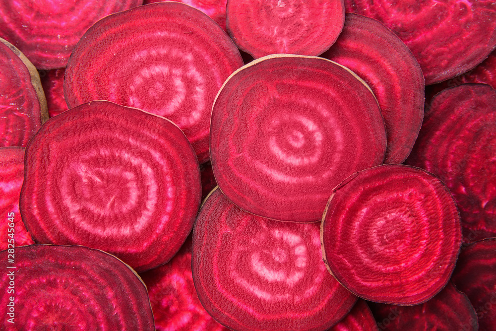 Sliced red beets as background, top view Sliced red beets as background, top view