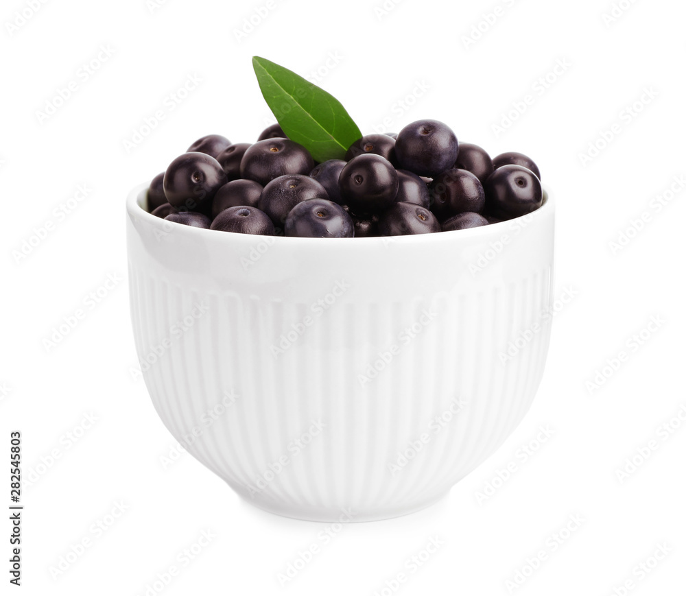 Ceramic bowl with fresh acai berries on white background Ceramic bowl with fresh acai berries on white background