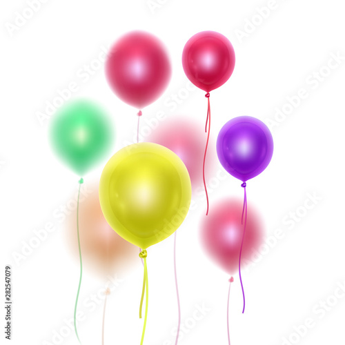 Realistic 3D glossy balloons of rainbow colors with blur effect. Decorative element for party invitation design or greeting cards  Vector illustration