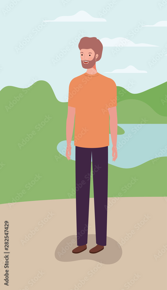 young and casual man with beard in the field young and casual man with beard in the field