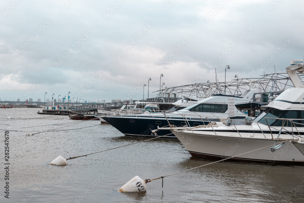 Fototapeta premium artisanal fishing boats and ride in Punta del Este Uruguay on a stormy day