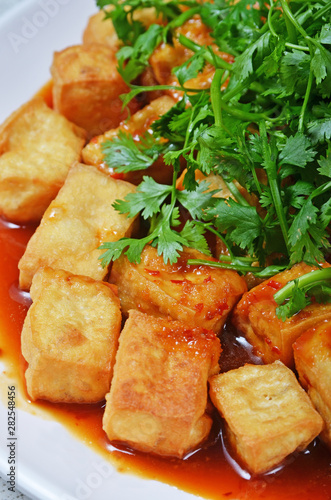 Fried diced tofu in savory sauce 