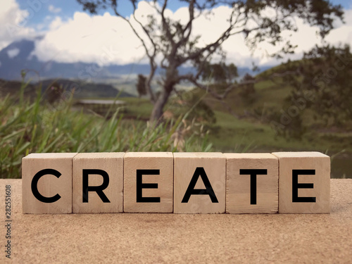 Photos Motivational and inspirational word - CREATE written on wooden blocks