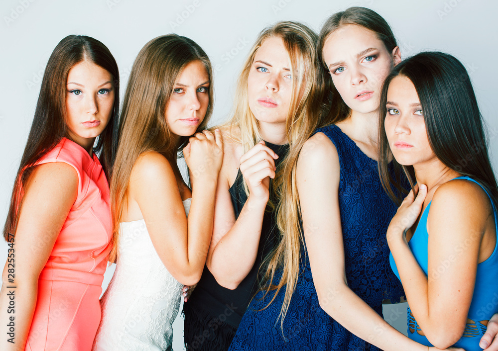 many girlfriends hugging celebration on white background, smiling talking chat close up, lifestyle people concept many girlfriends hugging celebration on white background, smiling talking chat close up, lifestyle people concept
