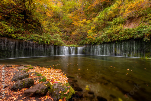 Shiraito fall in colorful autumn season, Karuizawa, Japan.