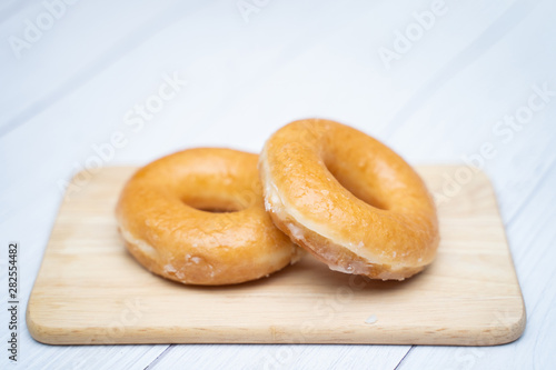 close up sugar coating doughnut
