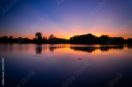 sunset over lake © MQphotos