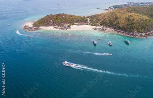 Aerial view on the sea and boat or speedboat. Beautiful natural seascape at the summer time. Island and beautiful beach. blue seascape