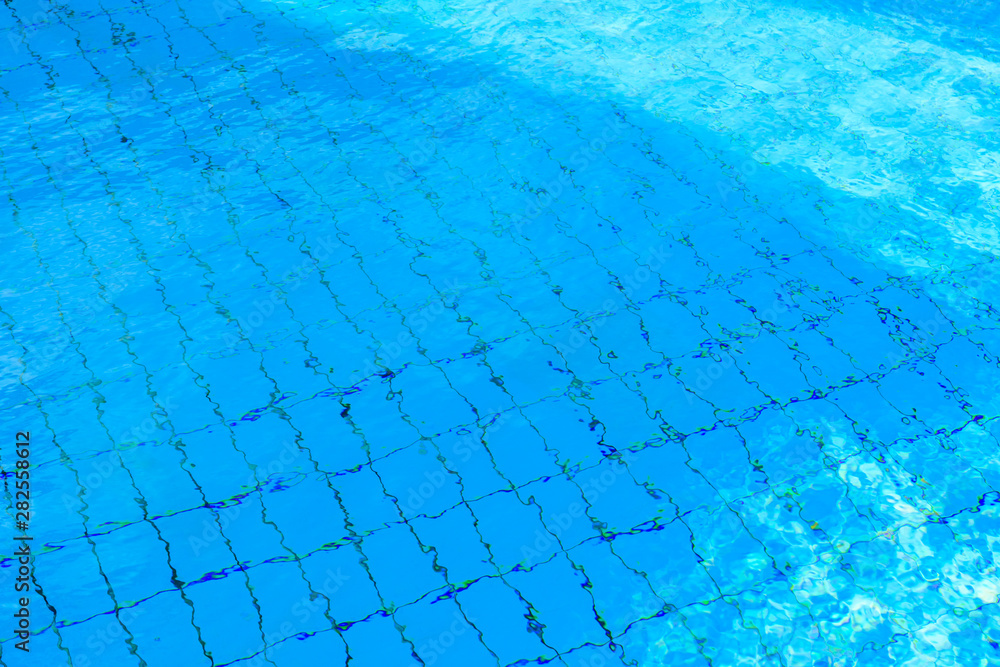 Background of the turquoise water in swimming pool