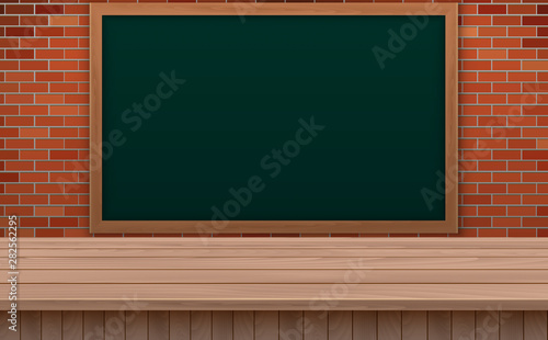green board and wooden table in the classroom