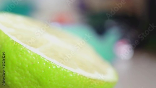 Zoom out shot of a half lemon sklice. photo