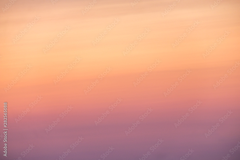 splendid gradient colourful sky at sunset with blue, pink to orange colour 