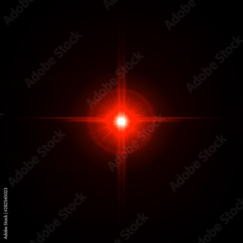 Obraz na płótnie Lens flare Red light special effect Black background w salonie