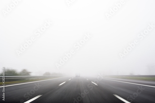 Abstract motion blur road. Black and white colors. Transportation background.