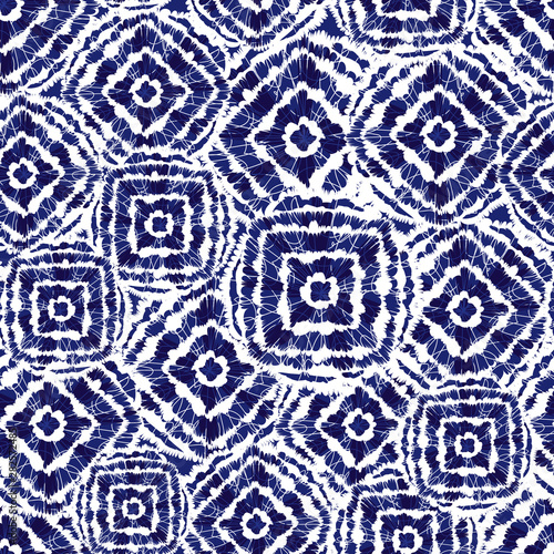 Vector blue and white shibori diamond and squares overlap patten. Suitable for textile, gift wrap and wallpaper.