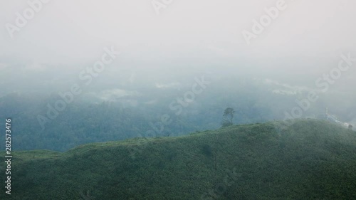 Time lapse very beautiful nature mountain and lake , Thailand BAN ETONG , Moving cloud and fog photo