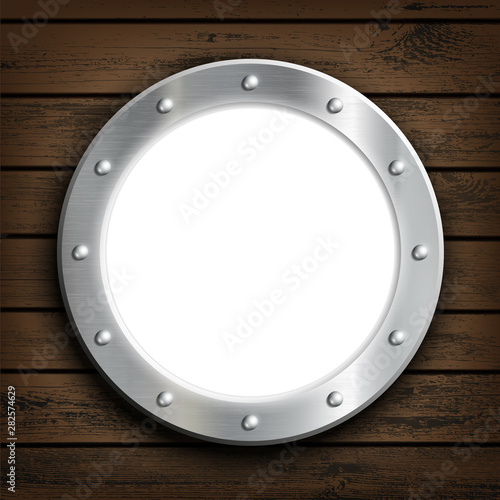 Window round ship porthole on a wooden wall