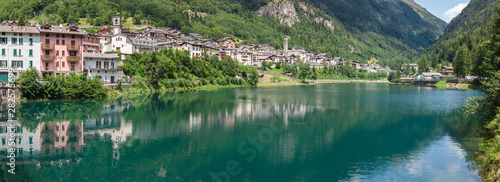 Carona. Bergamo, Orobie, Italian Alps, Italy. Landscape at the artificial lake and the village. Summer time photo