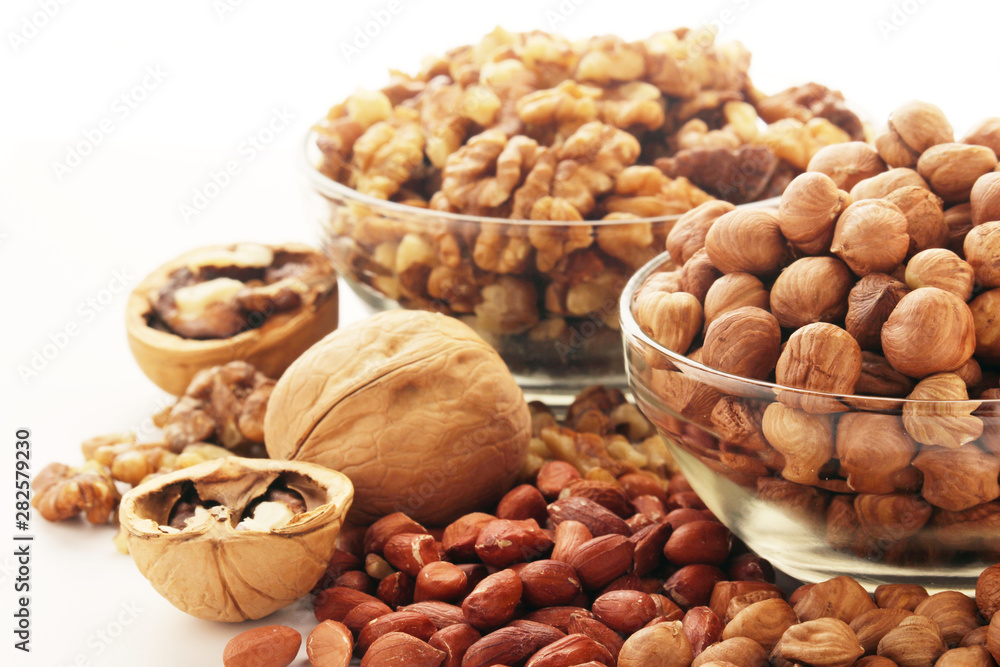Different nuts in glass cups Different nuts in glass cups