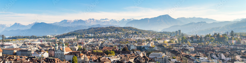 Aerial view of Luzern city center with beatiful swiss alps in the background, tourism town in switzerland