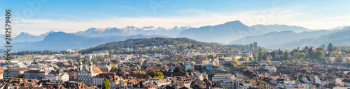 Aerial view of Luzern city center with beatiful swiss alps in the background, tourism town in switzerland