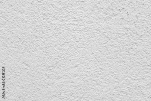 Texture of white stucco on a house wall.