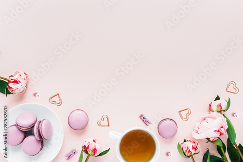 Greeting card with peonies and macaroons.