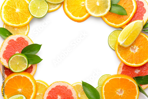 Frame made of different citrus fruits on white background